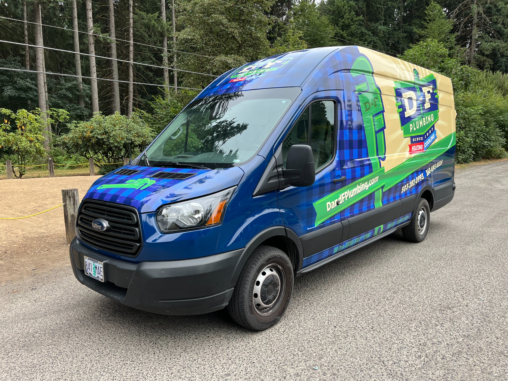 D&F Plumbing van wrap from a front three-quarter angle