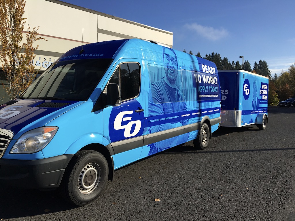 Employers Overload branded vehicle and matching trailer graphics