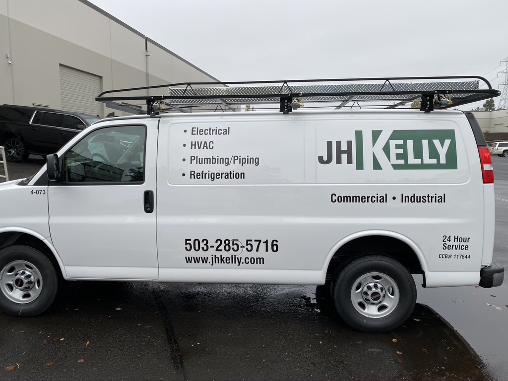 JH Kelly commercial service van fleet graphics