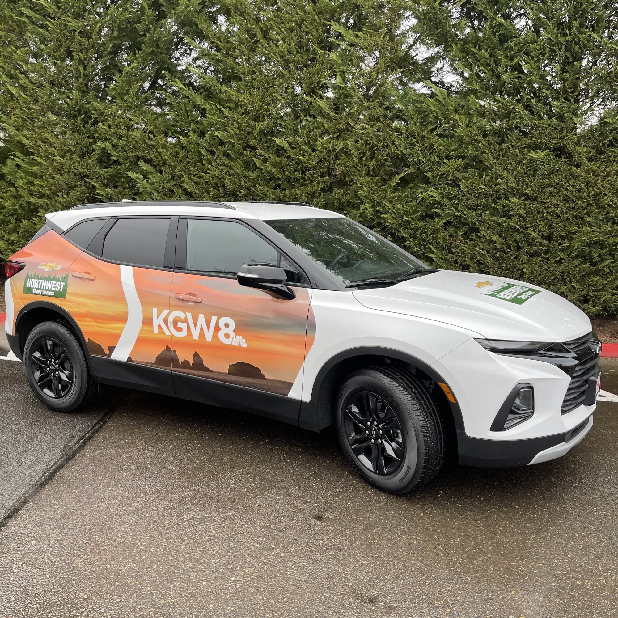 KGW 8 Chevrolet Blazer with orange coastal graphics, front three-quarter view