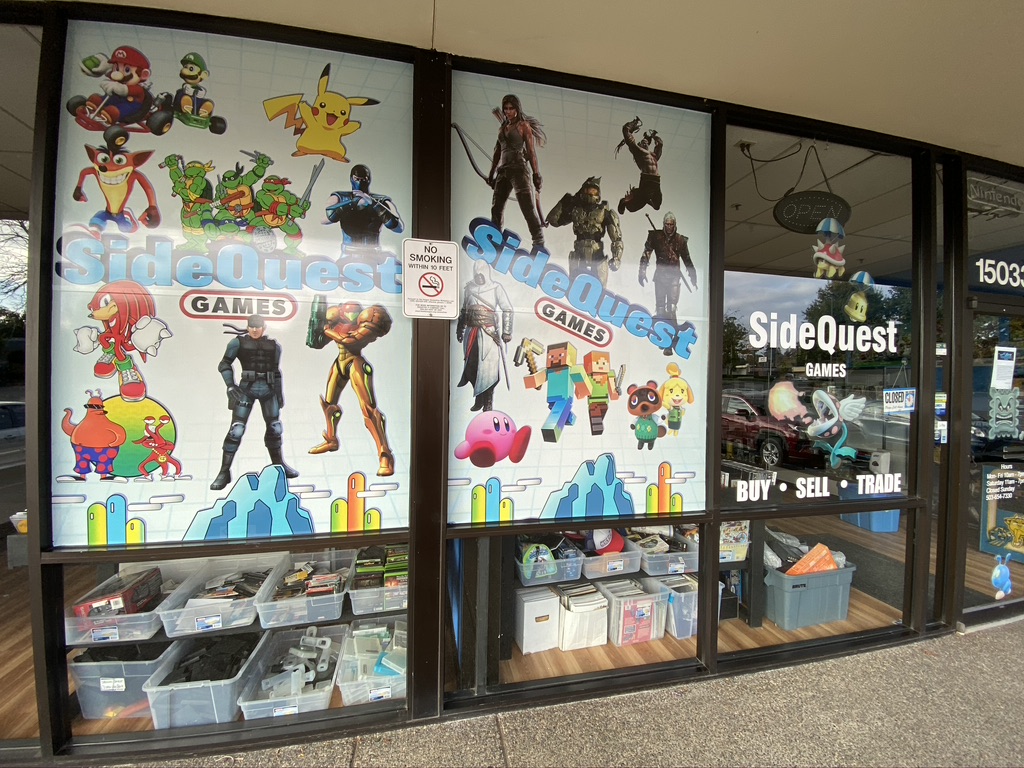 SideQuest storefront and window graphics